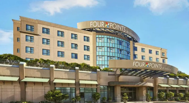 Кровать в общем номере Grand Park Hotel Vancouver Airport, an Ascend Collection Hotel