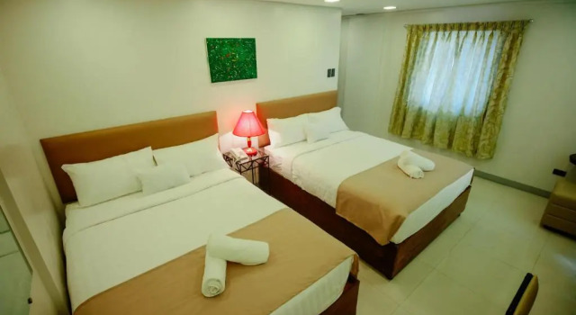 Четырёхместный номер Deluxe Belltower CSheLi Suites Bantay - Vigan