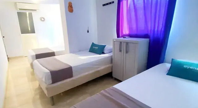 Четырёхместный номер Classic Hotel Puerto Vigia Inn