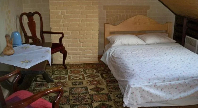 Alzana, Prenota Hotel Naujamiestis 