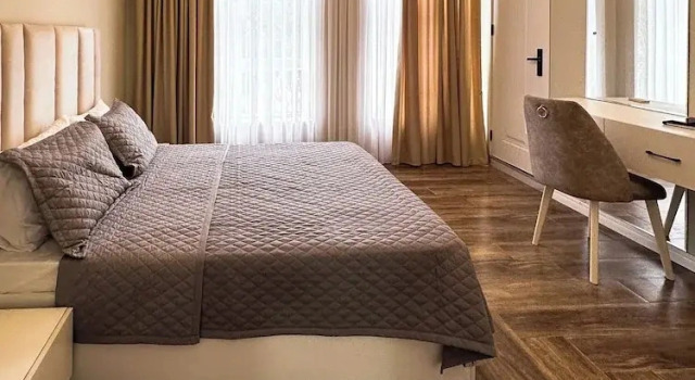 Standard famille chambre Vue jardin Central Vip Villa