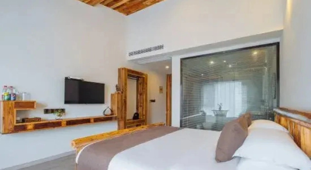 Кровать в общем номере Floral Hotel·Nanshan bamboo sea deep stream source root art people