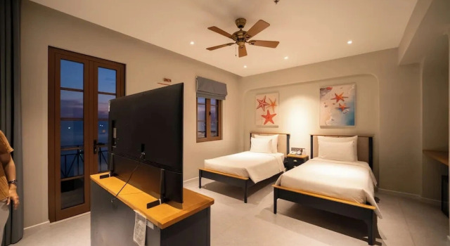 Двухместный номер Deluxe с балконом и рядом с пляжем Lucie Cozy Home - Sunset Town Phu Quoc