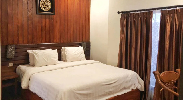 Puri Langenarjan Guesthouse, Book Hotel Hoteller i Kraton med parkering, Parkering