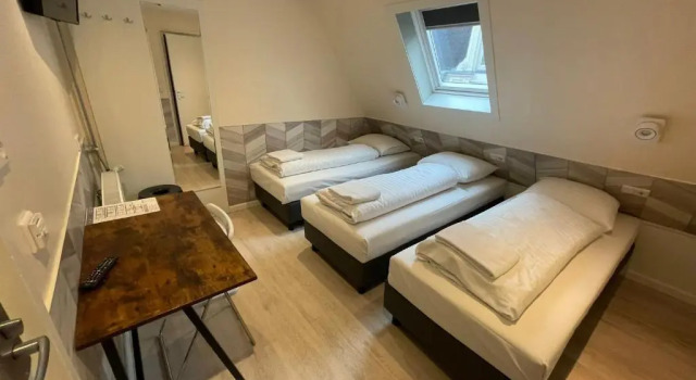 Трёхместный номер Standard Hotel Damrak Inn