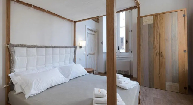 Четырёхместный номер Standard с балконом B&B Il Palazzotto di Luca Luxury Suites