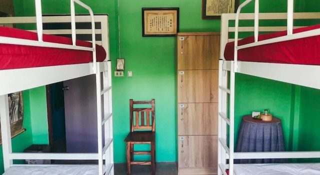 Кровать в общем номере Muster Guesthouse