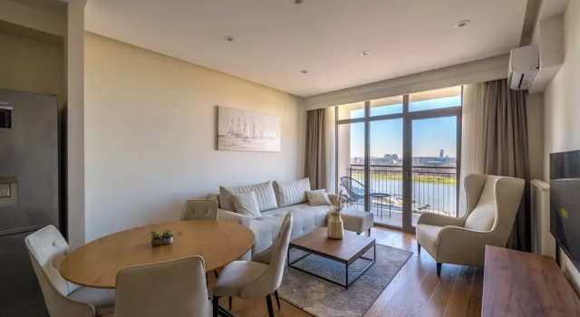 Апартаменты c 1 комнатой с балконом и с видом на реку Waterfront Residences