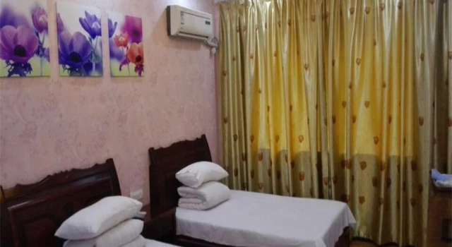 Xi Ke Lai Business Inn, Prenota Hotel Guangyuan Sichuan