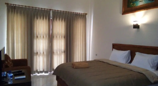 Двухместный номер Deluxe с видом на горы Family Garden Homestay