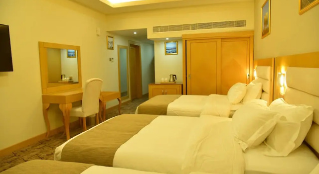 Standart üç kişilik oda Muscat Plaza Hotel