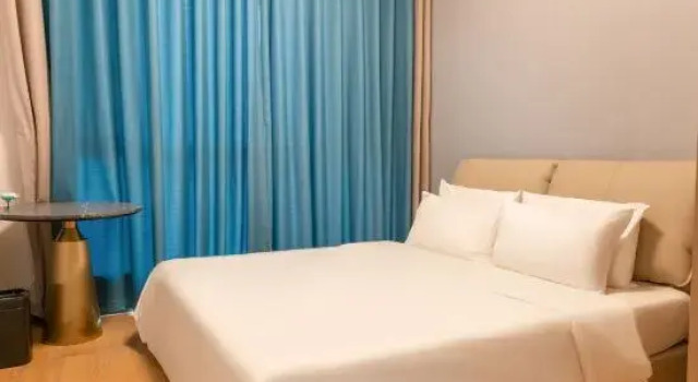Семейный люкс Deluxe с 4 комнатами Yantai Puyuan  Hotel