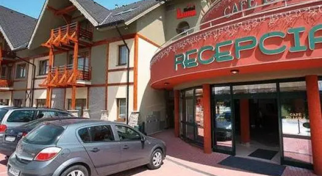 Кровать в общем номере Hotel Bešeňová