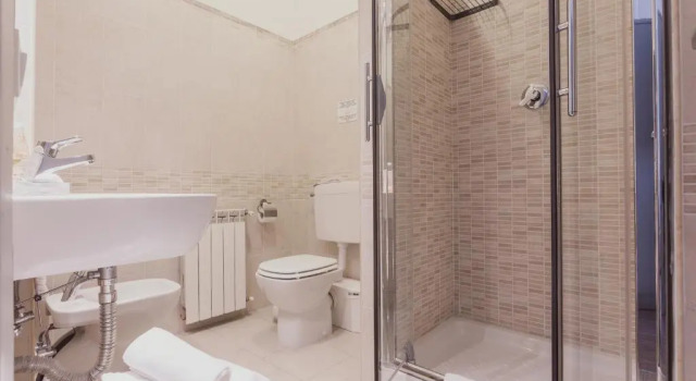 Апартаменты Deluxe Check-Inn Rooms