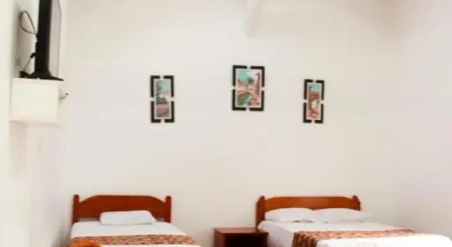 Habitación triple Estándar con balcón Intiraymi Guest House