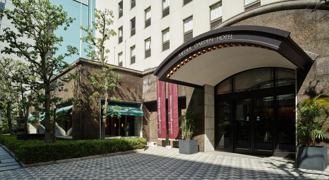 Кровать в общем номере Mitsui Garden Hotel Osaka Yodoyabashi