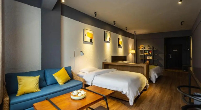 Номер Deluxe Comma Travel International Youth Hotel