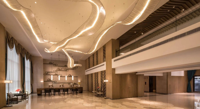 Четырёхместный номер Deluxe Ramada by Wyndham Zhenjiang City Center