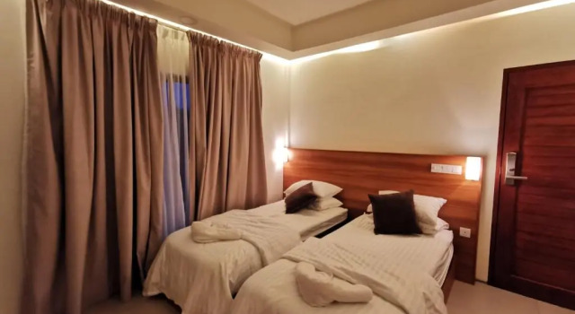 Номер Deluxe Niru Isle Maldives