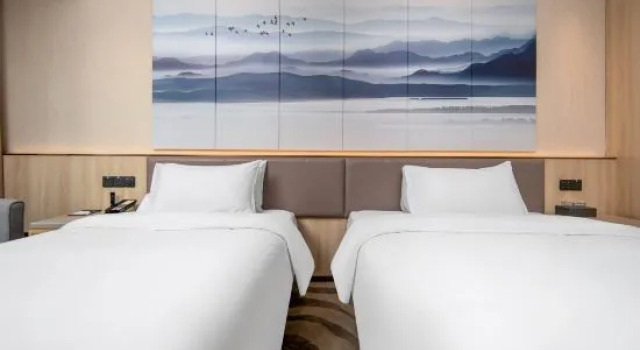 Кровать в общем номере Jingshiyuan Hotel (CBD Convention and Exhibition Center, East High-speed Railway Station)