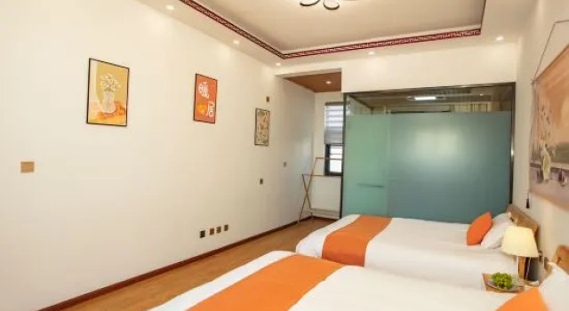 Кровать в общем номере Dali Haishi Hospital Homestay