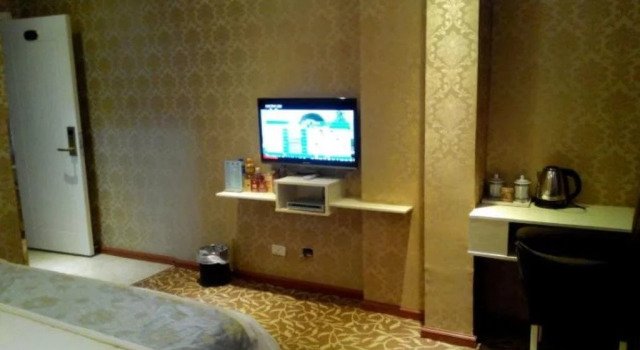 Qujing Ruixin Business Hotel, Buchen Sie Hotel Qujing Yunnan