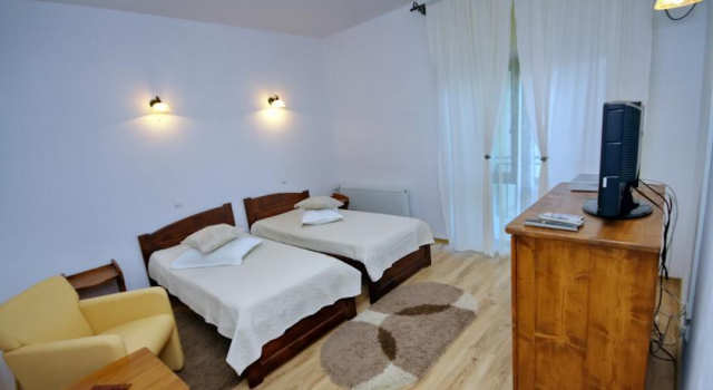 Pensiunea Lotus, Rezerwuj Hotel Ilganii de Jos Tulcza