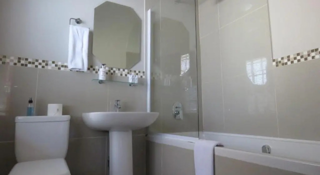 Cama em dormitório Abiénto Guesthouse
