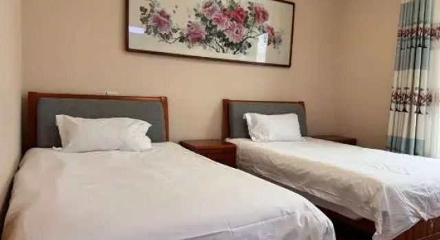 Xuelu Zhenxuan Qingshan Homestay, Rezervovat Hotel Ťi-lin Jilin
