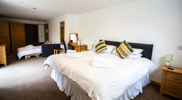 1 soveværelse i Deluxe firedobbelt værelse The Windmill Inn
