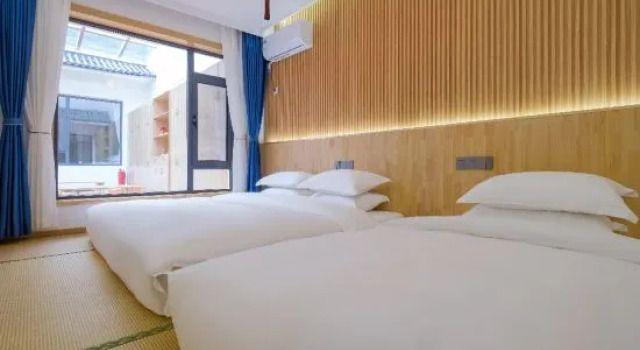 Двухместный люкс Deluxe Wutai Mountain Jiuduolian Homestay