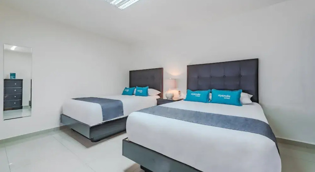 Номер Superior Suites Ejecutivas Monterrey