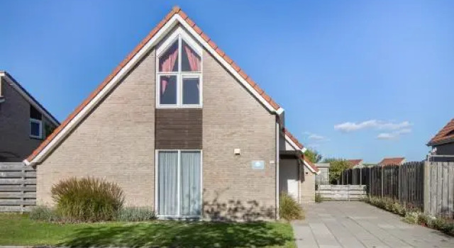 Vrijstaand vakantiehuis met tuinhuis en veranda - Zwin 4, Забронировать Отель Отели Zeeuws-Vlaanderen с парковкой, Парковка