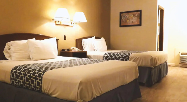 Четырёхместный номер Deluxe Coratel Inn & Suites by Jasper McCook