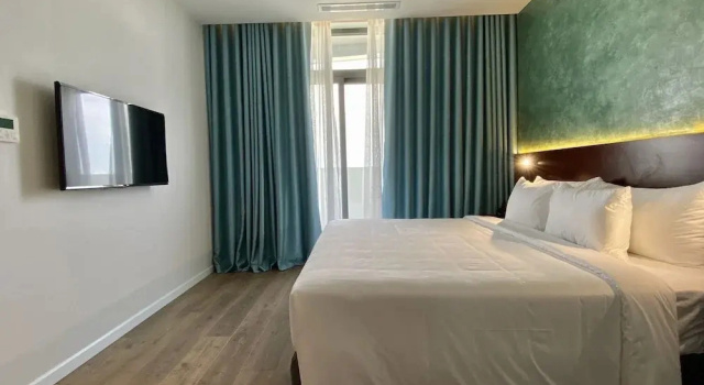 Двухместный семейный люкс NEWCC HOTEL AND SERVICED APARTMENT