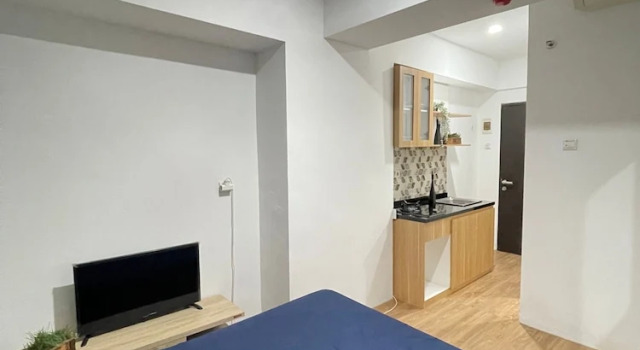 Студия Comfy Studio Apartment at Grand Asia Afrika By Travelio