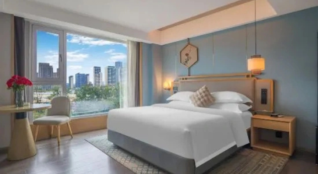 Семейный люкс с 2 комнатами Kunming Guandu Muyunpan Garden Resort Hotel (Hai Le World Shijicheng Changhong West Road Branch)