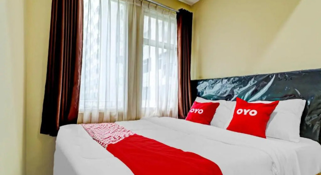 Номер Superior OYO 90266 Jarrdin Apartement By Bedpacker