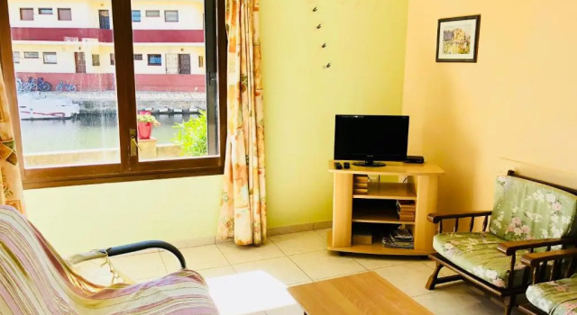 PORT SOTAVENT 16A - Apartamento en la Marina de Empuriabrava - piscina comunitaria, - parking - vistas al canal - cerca centro y playa