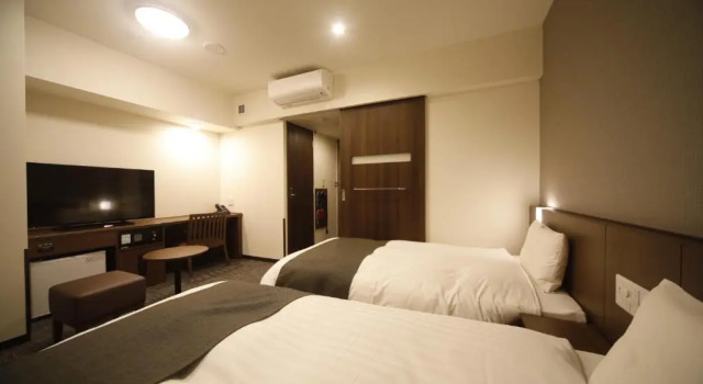 Номер Deluxe Dormy Inn Oita