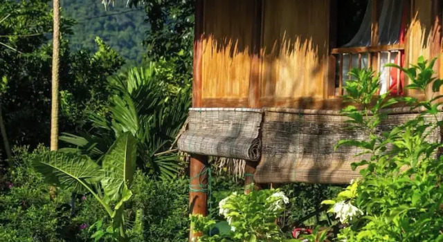 Кровать в общем номере Thai House Heritage Pu Luong