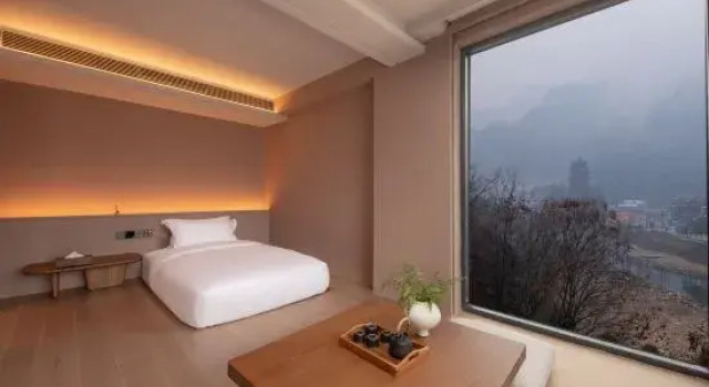 Люкс Отель Zhangjiajie Qishi Li Cave Homestay