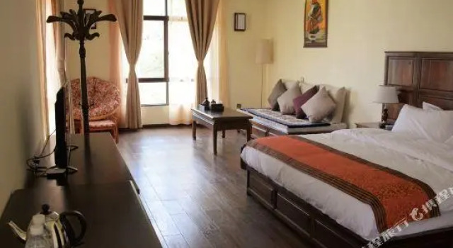 Zangdi Impression Hotel, Varaa Hotelli Benzilan Yunnan