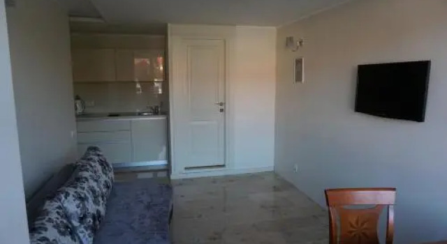Downtown Apartaments, Boek Hotel Nida 