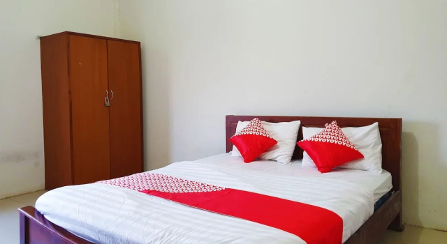 Pondok Mulia Guest House by OYO Rooms, Rezervovat Penzión Hotely v Kalimantan s parkováním, Parkování
