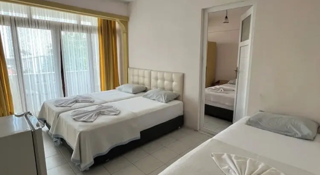 Standardowy rodzinny pokój i balkonem i z widokiem na morze İnka Otel