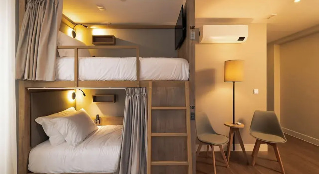 Łóżko w pokoju wieloosobowym Monturi Hostel