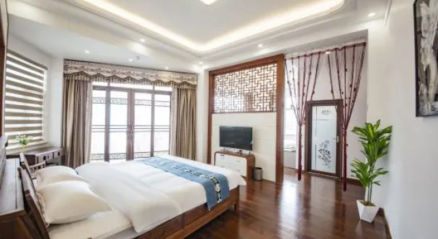 Семейный люкс Deluxe с балконом MeizhouIsland Xike Holiday Homestay