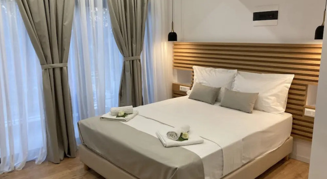 Двухместный номер Deluxe с балконом и с частичным видом на море Ampoulos Rooms & Apartments