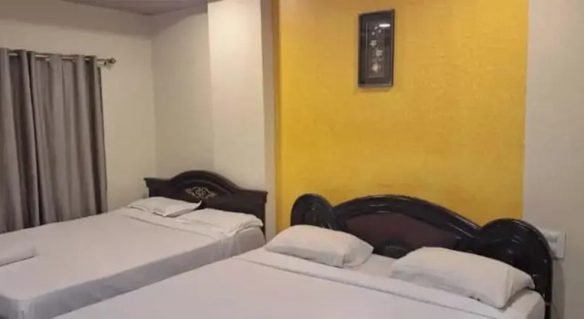 Standard quadruple chambre Hotel Pavan Mansion